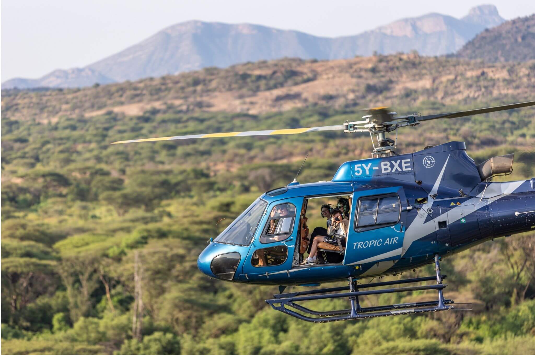 An exhilarating flight over Northern Kenya, with the doors wide open! © Sam Stogdale