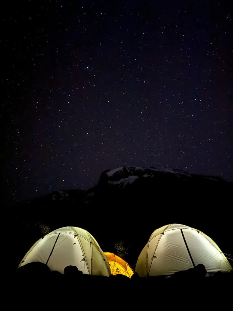 Camping beneath the summit of Mount Kilimanjaro © Sean Darnborough