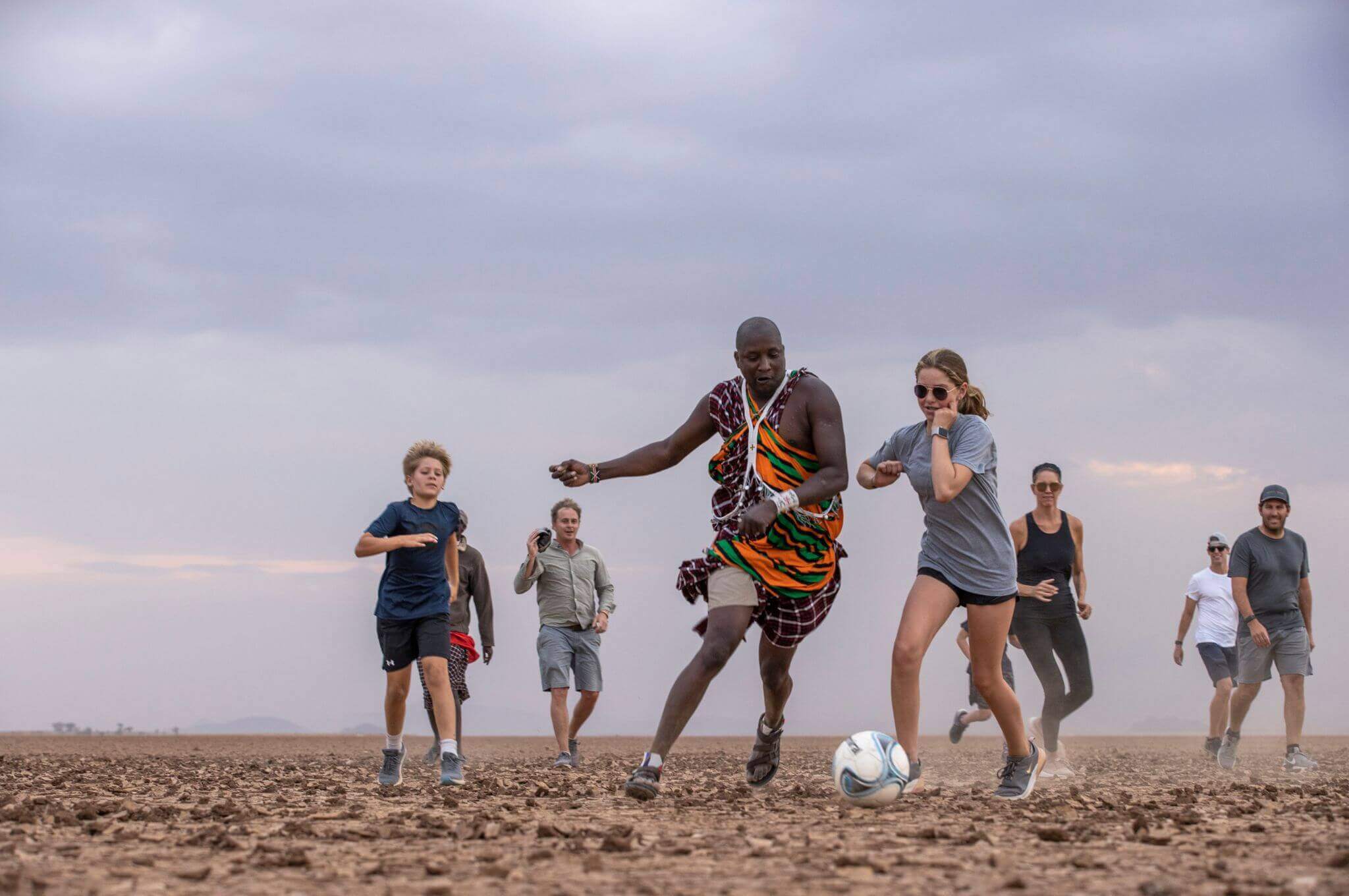 Join Leyan for a friendly game of footie on the Amboseli lake bed.